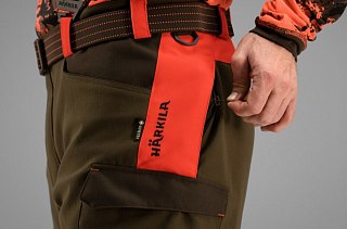 Härkila Hose Wildboar Pro Wildboard Orange/Willow Green | Huntworld.de